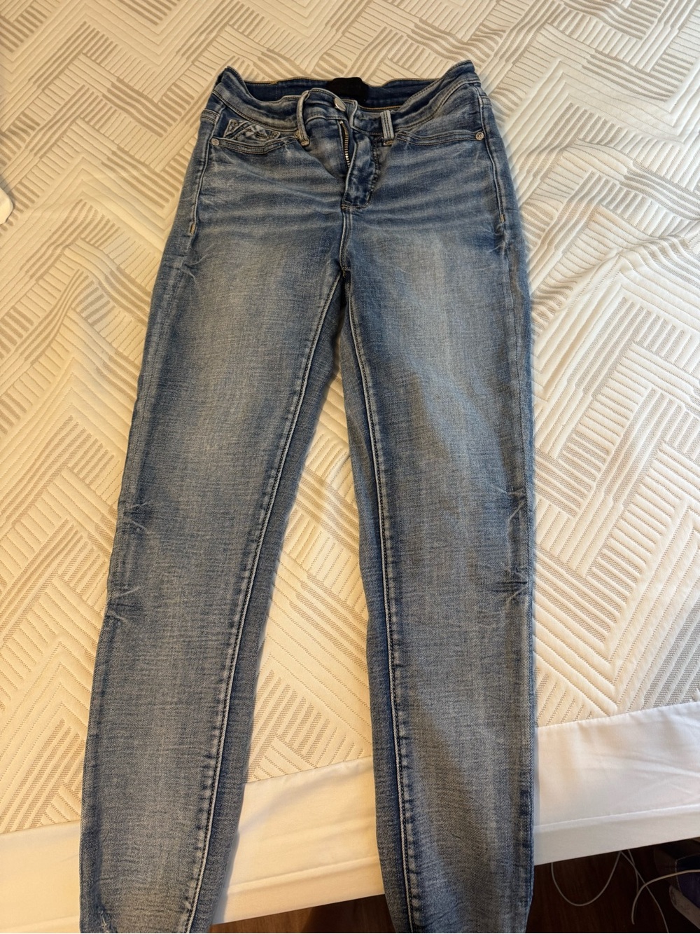 Buckle Skinny Jeans in Light Blue Wash
